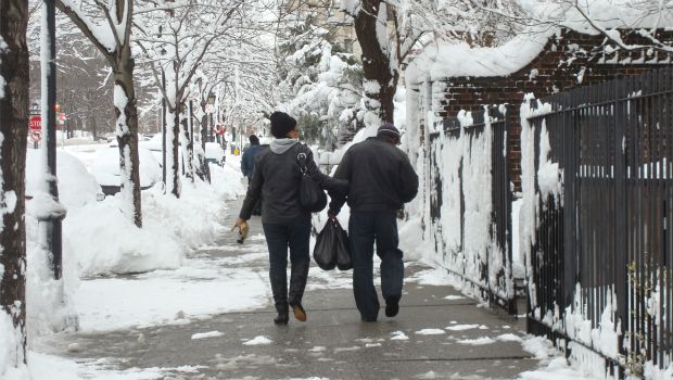A couple makes their way through the snow in Prospect Heights, Brooklyn on January 27.
