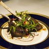 The 'Spoils' dinner served on looted Saddam Hussein plates. 