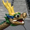 A closer look at the boat's bow reveals a detailed dragon head and tail.