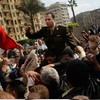 An Egyptian Army officer sympathizing with marchers is carried during an anti-government protest in Tahrir Square January 30, 2011 in Cairo, Egypt.