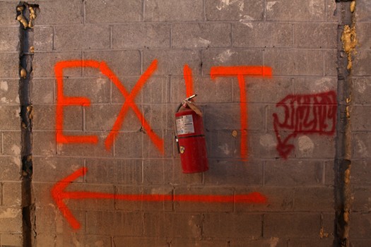 Well marked exit signs at the Deutsche Bank building in lower Manhattan where there are only a few stories left to demolish.