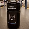 Trash can at subway station.
