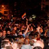 Hundreds gather outside of the Stonewall Inn to celebrate the passage of a same-sex marriage bill.