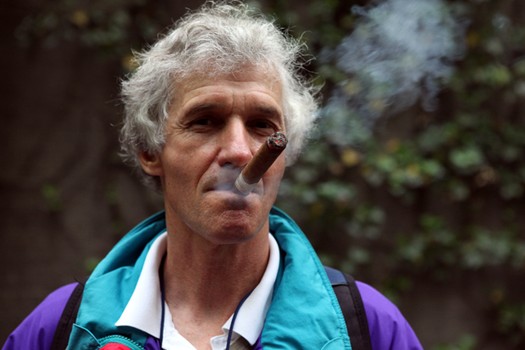 George Mandler, 59, a smoker of 50 years in Paley Park to enjoy a post-work cigar.