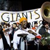 Musician Harold Wilson chants as fans celebrate the Giants World Series win at the Civic Center Plaza November 1, 2010 in San Francisco, California.