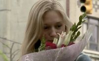 girl smells flowers