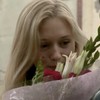 girl smells flowers