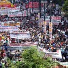 Some of 20,000 demonstrators march during a protest marking the 24-hour gerneral strike against the austerity measures in central Athens on May 20, 2010. 