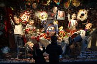 Children check out a Barneys New York window: Mario Batali, Bobby Flay, Emeril Lagasse, Guy Fieri with his signature squeeze bottle and Wolfgang Puck, who is chewing on a giant shrimp, are in the thro