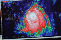 A computer images shows hurricane Earl as it passes through the Caribbean at the National Hurricane Center on August 30, 2010 in Miami, Florida. 