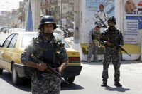 Iraqi soldiers man a checkpoint in Baghdad on August 19, 2010 after the last US combat brigade pulled out of Iraq.
