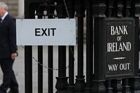 A man leaves the Bank of Ireland in Dublin, on November 15, 2010. Ireland admitted Monday it is in contact with 'international colleagues' over its debt crisis but denied seeking a bailout.