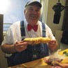 Farmer Lee Jones with one of his 'Creamsicle' sweet potatoes.