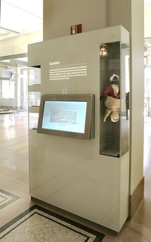 High-tech kiosks impart information about exhibits and the society.
