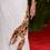 Editor-in-Chief of Vogue Anna Wintour considers the lobster with the dress she wore to the Met Museum Costume Institute Gala.