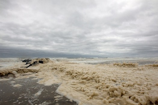 Heavy surf pounds the beach after Hurricane Irene swept through on August 28, 2011 in Long Beach, New York. 