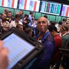 Traders on the floor of the New York Mercantile Exchange on August 4, 2010 in New York City