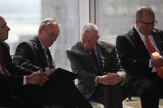 Mayor Michael Bloomberg showing S.I. Newhouse something on his iPad, during the press conference for Conde Nast's lease signing at One World Trade Center.