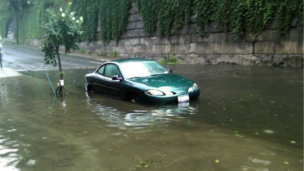 A car gets stuck on 12th Avenue, between 135th and 136th Street.