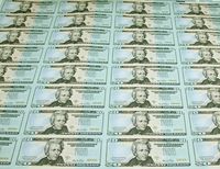 $20 bills, newly printed