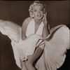 Arguably the most recognized costume in Hollywood film history: Marilyn Monroe in her ivory pleated “Subway” dress by Travilla, in <em>The Seven Year Itch.</em>