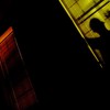 Man lurking at window