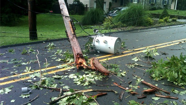 Massive hardwoods came down and snapped power poles and lines on Woodland Avenue in Brookside, NJ.