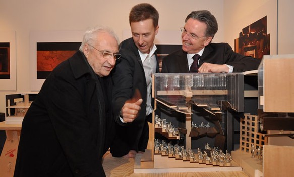 Architect Frank Gehry, Signature Capital Campaign Chair and Board Member Edward Norton and Signature Founding Director James Houghton check out one of the center's model.