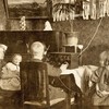 children listening to an old radio