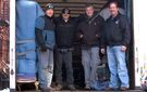Bill Hennessy (far right) with the brainy piano movers of Keyboard Express