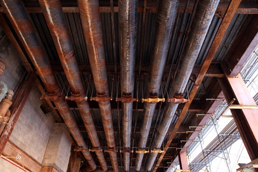 Water pipes to aid workers in demolishing the Deutsche Bank building.