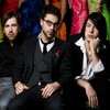 The members of Plushgun.