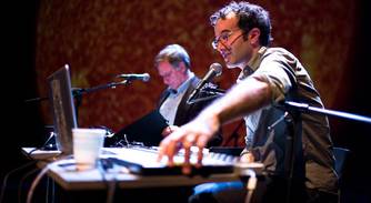 Jad and Robert on stage for Radiolab Live: In the Dark
