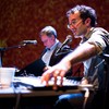 Jad and Robert on stage for Radiolab Live: In the Dark