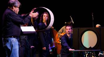 Robert Krulwich on stage with Pilobolus in Berkeley for Radiolab Live: In the Dark