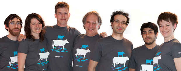 Radiolab staff in goat-on-a-cow tshirts