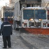 A city snow plow clears the streets of Red Hook, Brooklyn on January 27, 2011.