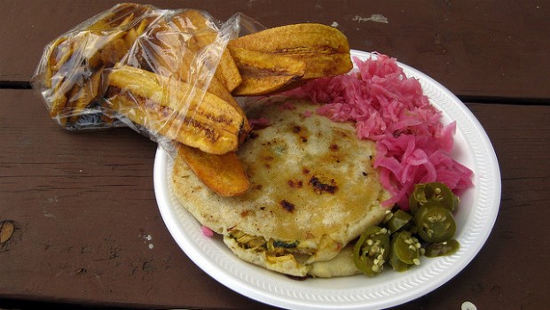 Across the street from Red Hook Pool delicious eats like this pupusa and plantains can be found.