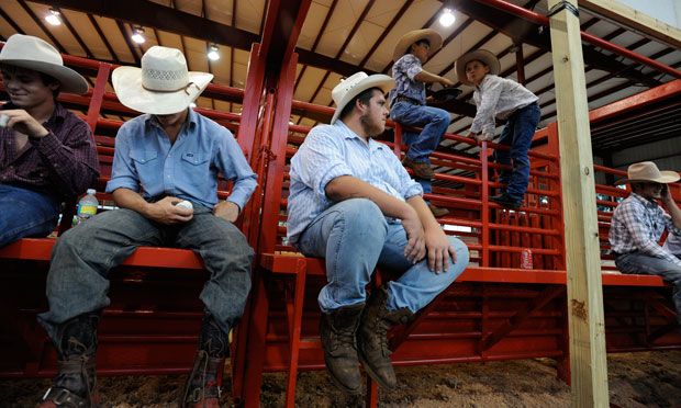 Rodeo hands wearing cowboy hats