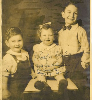 Leonard (right) with his brother and sister.
