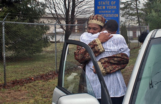 Amma hugs his son, 19-year-old Anthony Williams.