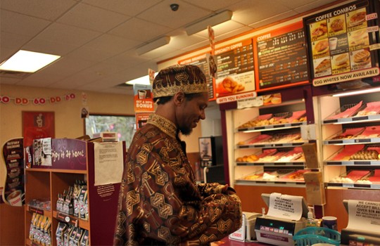 Amma insisted on a stop at Dunkin Donuts for Boston cream, coconut, and glazed donuts -- his first food as a free man.