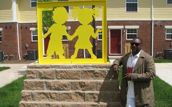 Mixed media and performance artist Jerry Gant with his latest public art commission at a new development of the Newark Housing Authority.

Jerry Gant’s site: www.aeroblues.com 