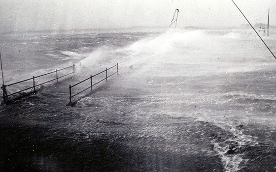 Water rushes over pier at Wood Hole, MA, Sept. 21, 1938. Thanks to the Long Island Museum’s current exhibit, “Eye on the Storm: Long Island's Dangerous Coast”