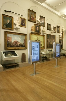 The reconfigured Robert H. and Clarice Smith New York Gallery includes multi-media installations at kiosks. The show introduces major themes of American history through stories and figures.