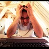 stressed out man at computer