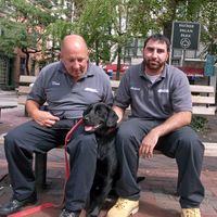 David Kendrick, Anthony Carasa and the bed bug sniffing dog, Cassie, of Action Bed Bug Control