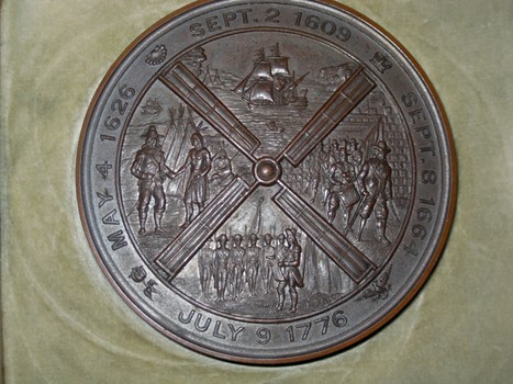 The back of the bronze medal commemorating the consolidation of the five boroughs into one city.