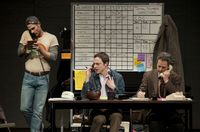 Luke Macfarlane, Jim Parsons, and Patrick Breen (left-to-right) work the switchboard for an activist group fighting the epidemic in The Normal Heart. 