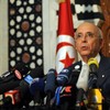 Tunisian Prime Minister Mohamed Ghannouchi announces the new government during a press conference at the Tunisian president's office on January 17, 2011 in Tunis. 